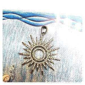 The sunburst necklace is very classy.